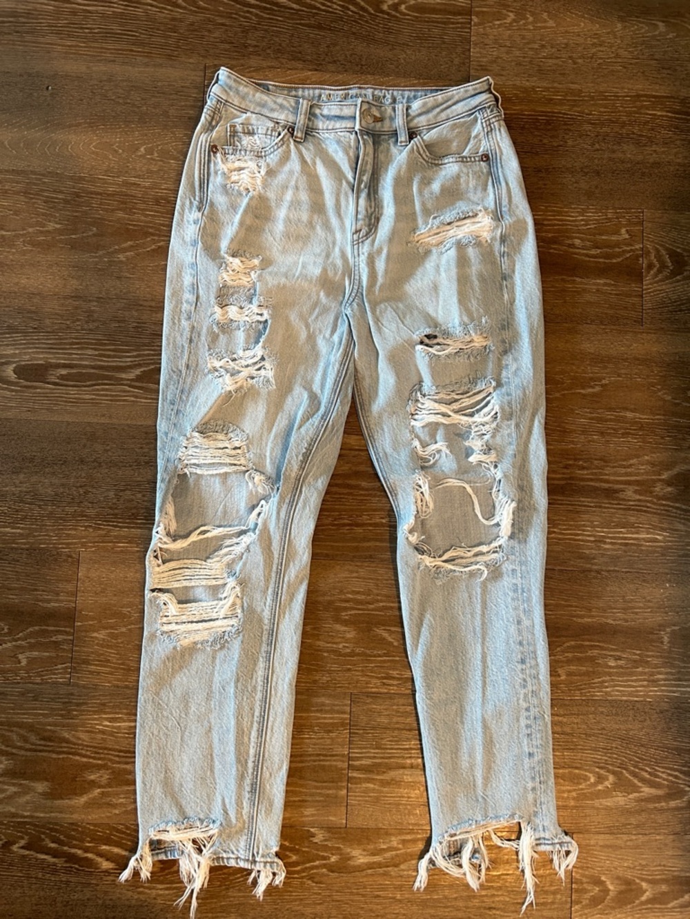 ripped / distressed mom jean